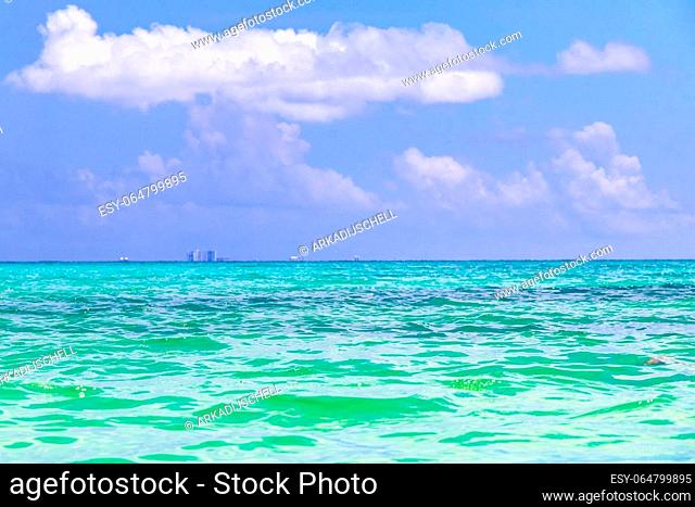 Tropical mexican Caribbean sea and beach landscape panorama view to Cozumel island cityscape with clear turquoise blue water in Playa del Carmen Quintana Roo...