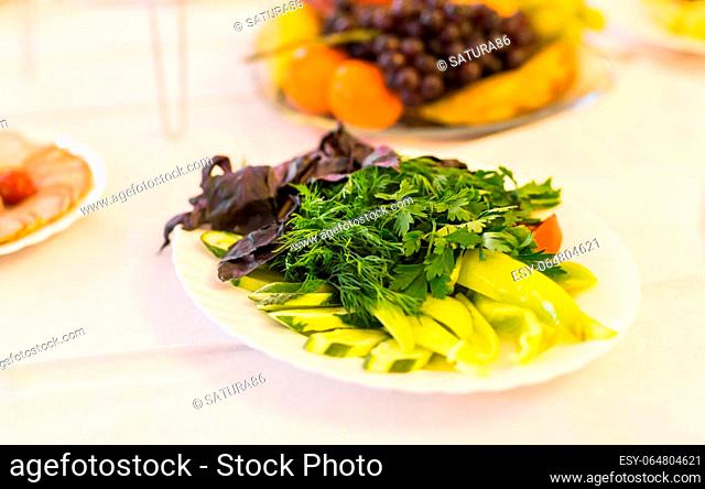 tasty vegetable salad on plate festive table