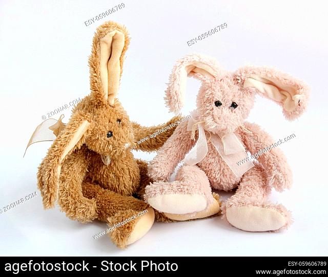 Two sad fluffy Easter bunnies made by yourself from old rags