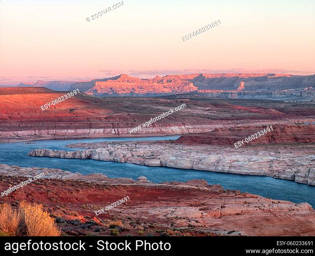mountain range and water stream with clear sky in background