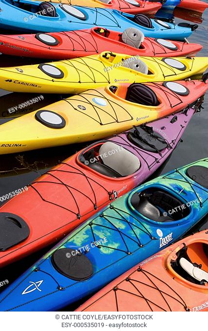 Kayaks lined up outside North Shore Kayak Outdoor Center in Rockport, MA