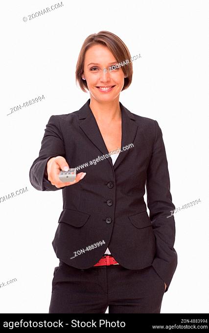 Businesswoman stay with remote control isolated on white