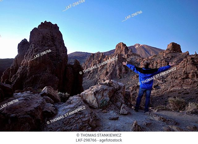 Hiker at Las Canadas with Teide in the evening, Parque National del Teide, Tenerife, Canary Isles, Spain, Europe