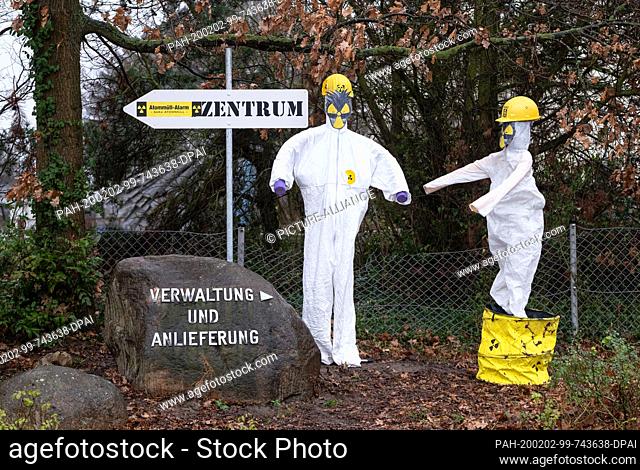 02 February 2020, Lower Saxony, Grohnde: Striking puppets were placed in front of the nuclear power plant in Grohnde by anti-nuclear activists as a protest