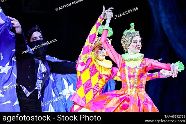 RUSSIA, MOSCOW - DECEMBER 9, 2023: Ballet dancers Bogdan Pleshakov (C) and Yekaterina Chekryzheva (R) of the Kremlin Ballet Theatre as Harlequin and Columbine...