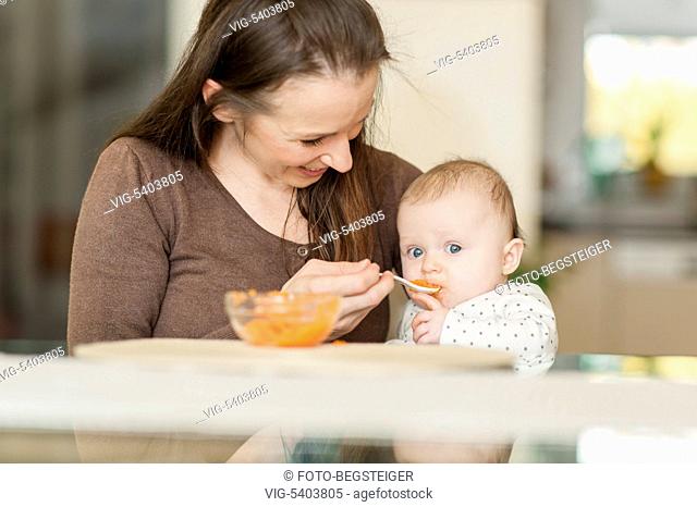 mother feeding baby child, 6 month - 11/02/2016