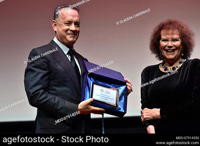 American actor Tom Hanks receives the Lifetime Achievement Award from Claudia Cardinale during the 2016 Rome Film Fest in the Auditorium Parco Della Musica