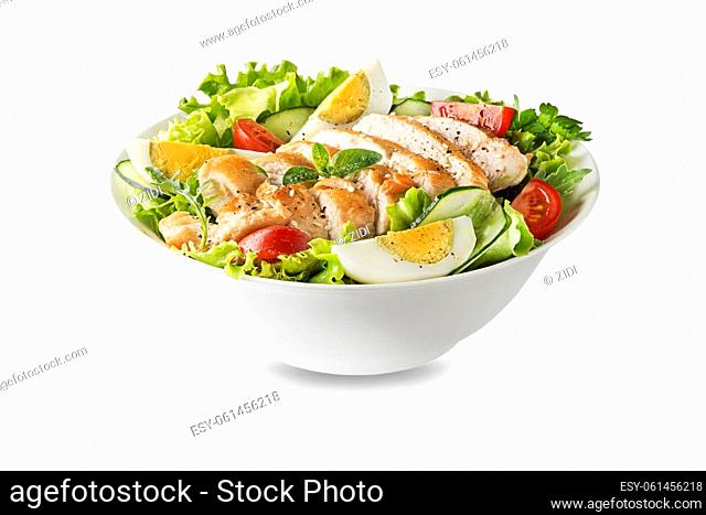 Fresh green salad with chicken breast and boiled egg isolated on white background