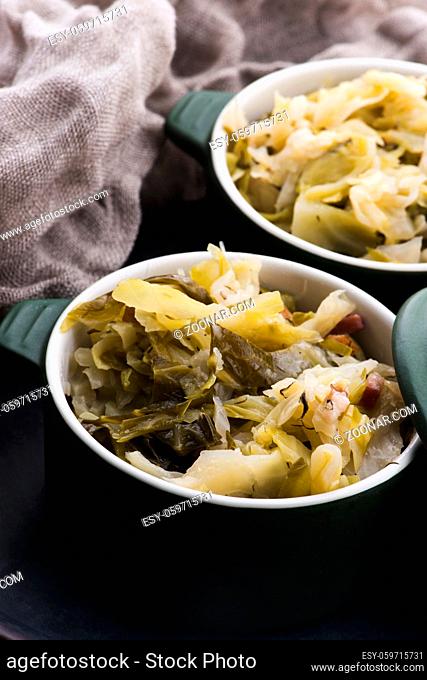Stew of white cabbage and bacon. Vegetables, background