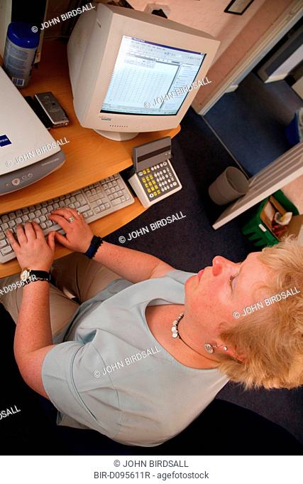 Woman with visual impairment at computer