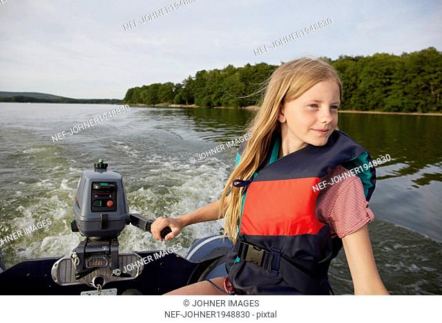 Teenage girl on boat, Skane, Sweden