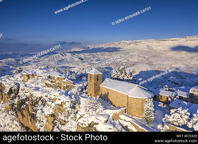 Siurana village aerial view in a winter snowy sunrise after a heavy snowfall (Priorat, Tarragona, Catalonia, Spain)