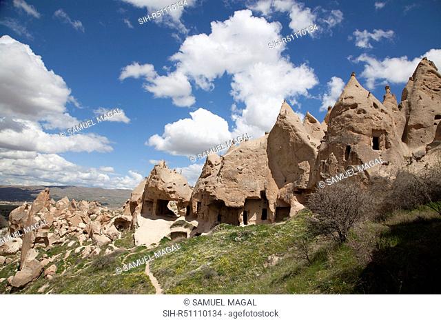 As a result of the Erciyes Volcano eruption, thousands of years ago, a hard cap rock was created on tall pillar and formed the fairy chimneys