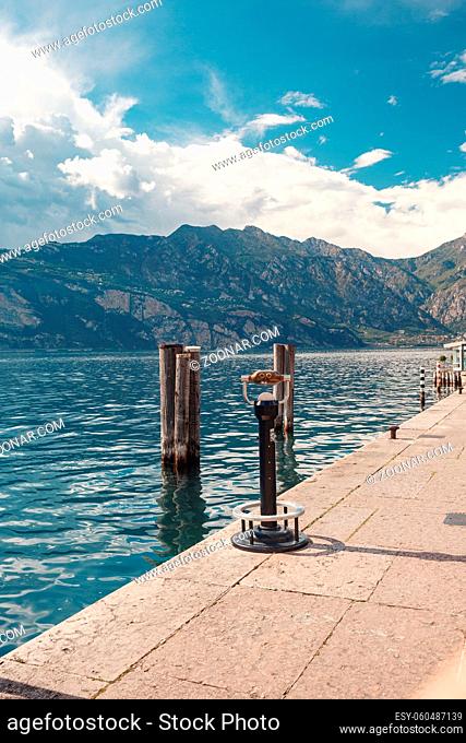 Summer morning on Lake Garda. Italy, Europe. It is located in Northern Italy, about half-way between Brescia and Verona, and between Venice and Milan
