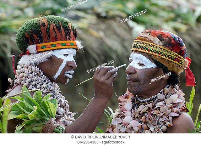 Performers preparing for a Sing-sing at Paiya Show, Western Highlands, Papua New Guinea, Oceania
