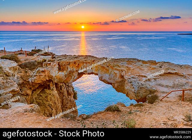 Famous stone Sin Bridge at sunrise in Ayia Napa Cyprus - nature background