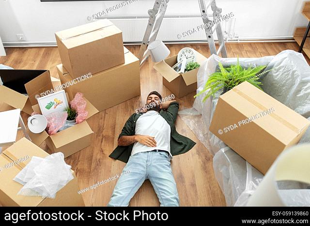 man with boxes moving to new home