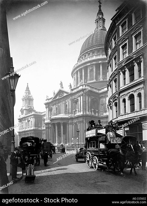 ST PAUL'S CATHEDRAL from Cannon Street, City of London. A horse-drawn bus, a barrow boy and other traffic in Cannon Street