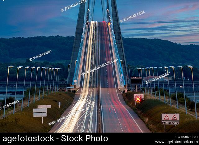 Light trails from cars at Pont de Normandie. Long exposure photograph at night