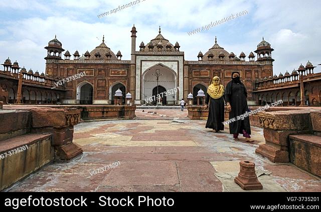 Agra, India - September 2020: Woman exiting the Jama Masjid mosque located near the Agra Fort on September 3, 2020 in Agra, Uttar Pradesh, India