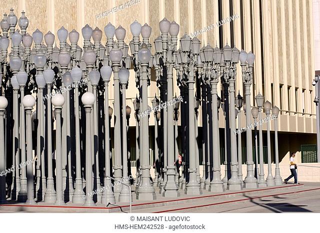 United States, California, Los Angeles, Museum Row, works by Chris Burden on Urban Light at the entrance to the Los Angeles County Museum of Art LACMA by...