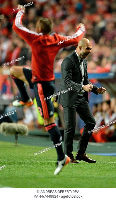 Munich's coach Josep ""Pep"" Guardiola and Rafinha celebrates the equalizer of Vidal during the UEFA Champions League quarterfinal second leg soccer match...