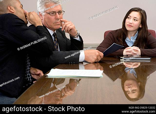 Man whispering in meeting