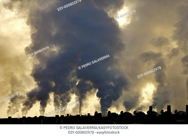 view of the smoke produced by a polluting industry in Saragossa, Aragon, Spain