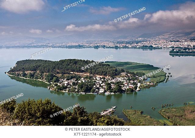 Looking across the Island of Nissi, on Lake Pamvotidha with the city of Ioannina in the background, Epirus, northern Greece