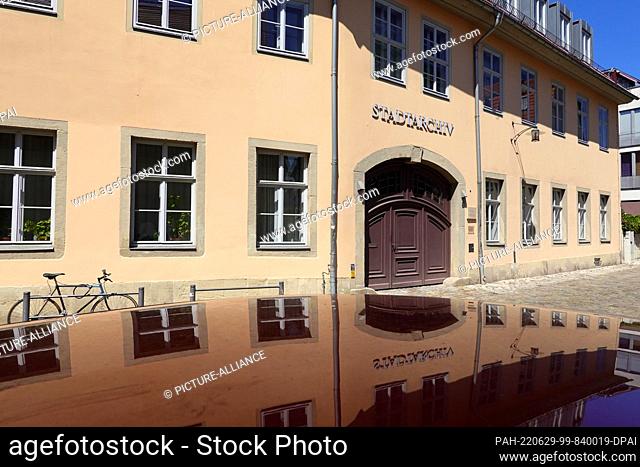 PRODUCTION - 28 June 2022, Thuringia, Weimar: ""Stadtarchiv"" (City Archive) is written above the entrance to the Weimar City Archive