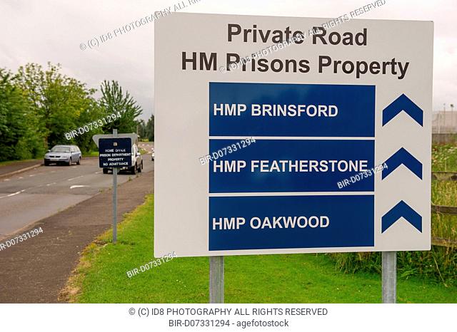 Road sign to the entrance of HMP Featherstone, HMP Brinsford and HMP Oakwood