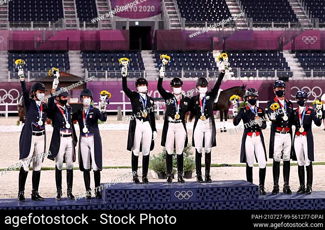 27 July 2021, Japan, Tokio: Equestrian sport/dressage: Olympics, Team, Final, Equestrian Park. Dorothee Schneider (l-r), Isabell Werth and Jessica von...