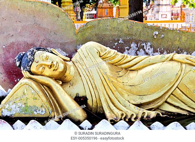 Old Reclining Buddha Statue Closeup