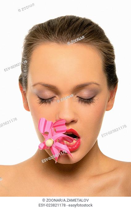 women hold in their teeth pink weathervane