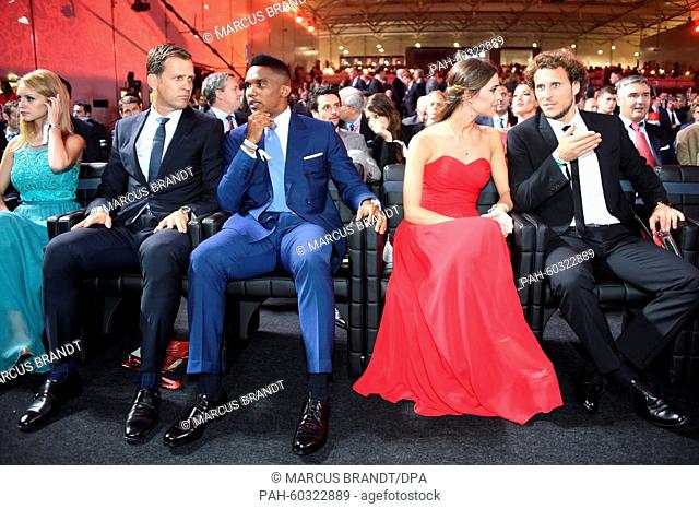 Oliver Bierhoff (2-L), team manager of the German national soccer team, Cameroonian soccer player Samuel Eto'o (C), Uruguayan soccer player Diego Forlan (R) and...
