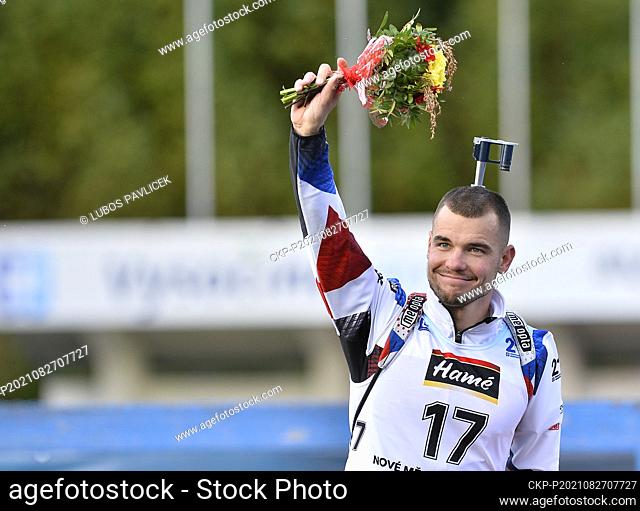 Czech Michal Krcmar greets fans after the IBU summer biathlon World Championships supersprint in Nove Mesto na Morave, Czech Republic, August 27, 2021