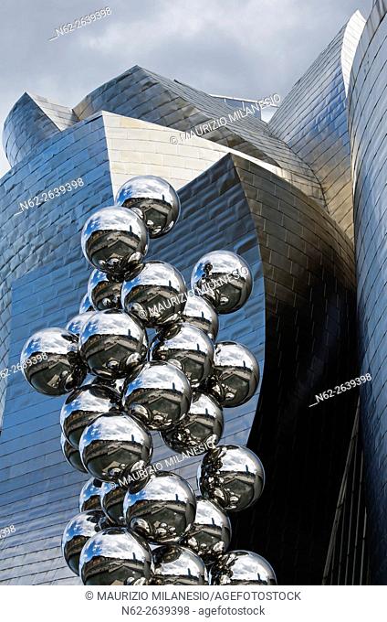 The great Tree and the Eye, sculpture by Anish Kapoor and Guggenheim Museum, Bilbao, Vizcaya, Basque Country, Spain