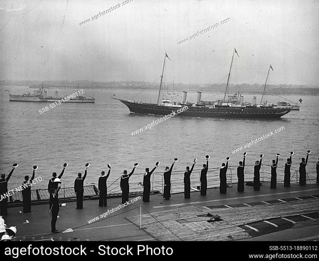 The King Reviews His Fleet At Spithead - Men of the aircraft-carrier ""Glorious"" cheering as the Royal yacht ""Victoria and Albert"" passed down the lines
