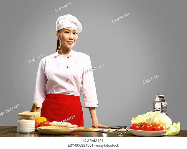 Portrait of Asian cooks, ingridenty on the table for cooking