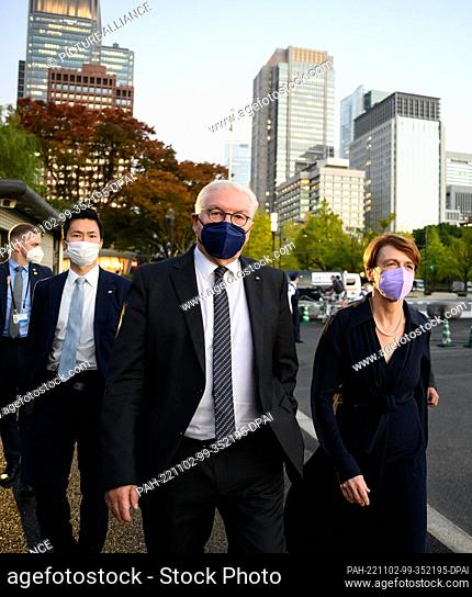 02 November 2022, Japan, Tokio: German President Frank-Walter Steinmeier and his wife Elke Büdenbender walk through a park near the Imperial Palace after their...