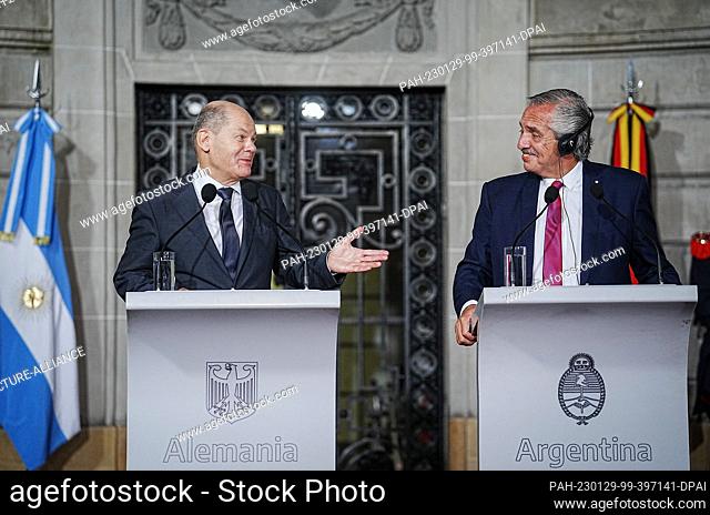 28 January 2023, Argentina, Buenos Aires: German Chancellor Olaf Scholz (l, SPD) and Alberto Angel Fernandez, President of Argentina