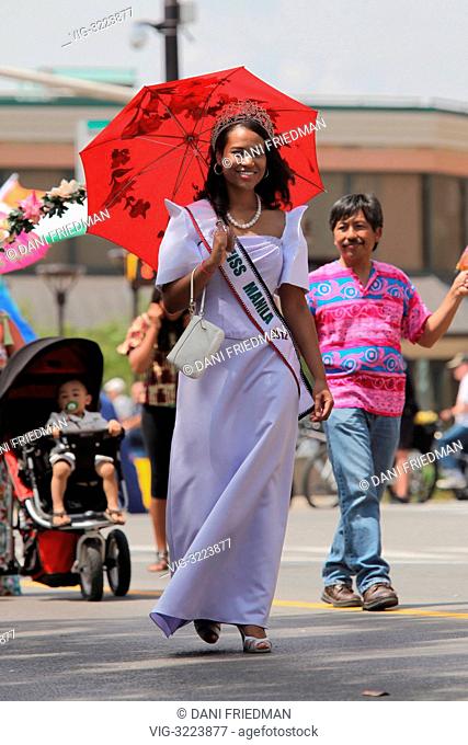 Miss Manila 2012 Aura Joy MITCHELLE attends the annual Flower City Parade in Brampton, Ontario, Canada. - BRAMPTON, ONTARIO, CANADA, 16/06/2012