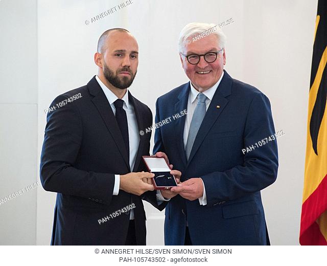 German President Frank-Walter STEINMEIER honors hockey player Felix SCHUETZ (Cologne). Awarded the Silver Laurel Leaf and the Order of Merit by the Federal...