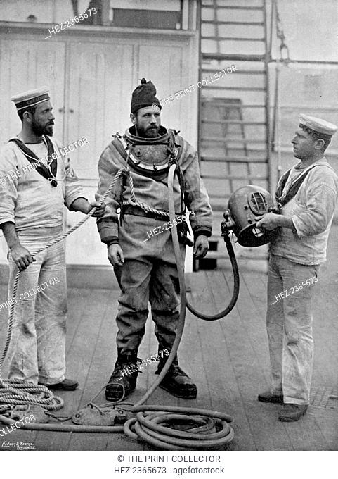 A diver from the battleship HMS 'Camperdown' in his diver's dress, 1896. A print from The Navy and Army Illustrated, 1st May 1896
