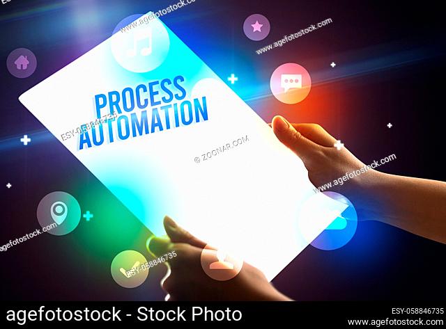 Holding futuristic tablet with PROCESS AUTOMATION inscription, new technology concept