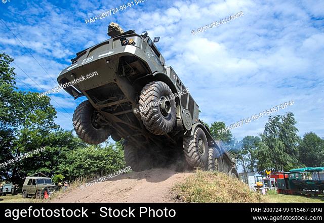 24 July 2020, Saxony-Anhalt, Beuster: A four-axis Sil 135 rocket launcher of the Soviet Red Army, built in 1966, travels over an off-road track during the Blue...