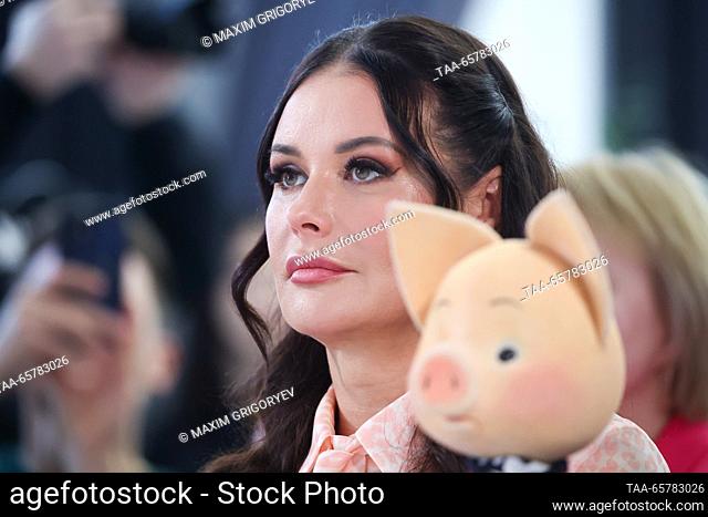 RUSSIA, MOSCOW - DECEMBER 15, 2023: Host Oksana Fyodorova attends a ceremony to cancel postage stamps marking 60 years since the launch of Good Night