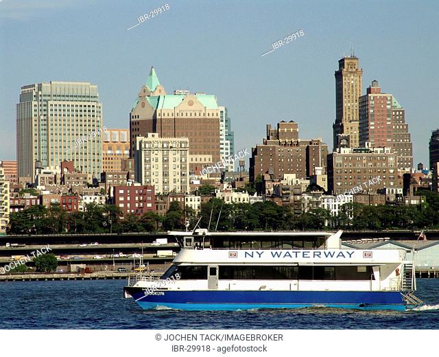 USA, United States of America, New York City: East River, Skyline of Brooklyn Heights, NY Waterway ferry boat