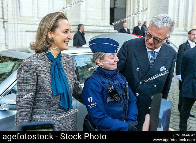 Princess Claire of Belgium, a female police officer and Prince Laurent of Belgium pictured during the Te Deum mass, on the occasion of the King's Feast