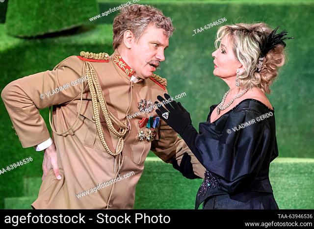 RUSSIA, MOSCOW - OCTOBER 26, 2023: Actors Vadim Kolganov (L) as Colonel Sir Francis Chesney and Tatyana Vedeneyeva as Donna Lucia perform during the premiere of...